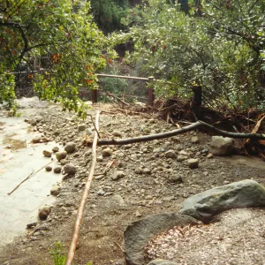 rocks and debris from Mission Creek flooding, above Mission Dam