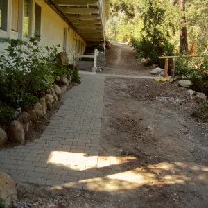 new pavers path along the first floor of the North Wing, outside the Arroyo Room