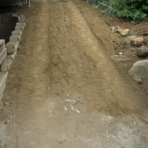 Pavering the path outside the Arroyo Room