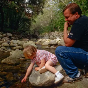 child and father, Mission Creek, Celebration of Trees 1996