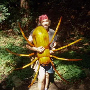Big Bugs installation, David Rogers holding the giant spider
