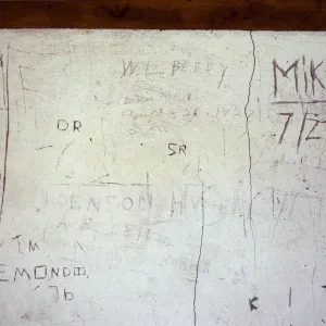 graffiti - Denton Hyder Ranch at Smugglers Cove, upstairs on W-facing wall at middle of building, Santa Cruz Island